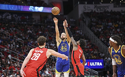 Oct 29, 2023; Houston, Texas, USA; Golden State Warriors guard Stephen Curry (30) shoots the ball as Houston Rockets guard Jalen Green (4) defends during the second quarter at Toyota Center. Mandatory Credit: Troy Taormina-USA TODAY Sports