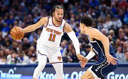 Jan 11, 2024; Dallas, Texas, USA;  New York Knicks guard Jalen Brunson (11) dribbles as Dallas Mavericks guard Josh Green (8) defends during the first half at American Airlines Center. Mandatory Credit: Kevin Jairaj-USA TODAY Sports