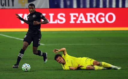 Nov 20, 2020; Nashville, TN, Nashville, TN, USA; Inter Miami defender Alvas Powell (2) takes the ball from Nashville SC defender Taylor Washington (23) during the second half at Nissan Stadium. Mandatory Credit: Christopher Hanewinckel-USA TODAY Sports
