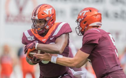 Sep 14, 2019; Blacksburg, VA, USA; Virginia Tech Hokies tight end James Mitchell (82) gets ball from quarterback Ryan Willis (5)  during game against Furman Paladins at Lane Stadium. Mandatory Credit: Lee Luther Jr.-USA TODAY Sports