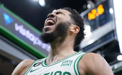 Jan 9, 2023; Boston, Massachusetts, USA; Boston Celtics forward Jayson Tatum (0) reacts after making a dunk in the last seconds of play against the Chicago Bulls in the second half at TD Garden. Mandatory Credit: David Butler II-USA TODAY Sports