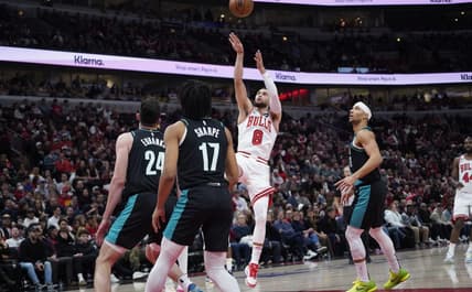 Feb 4, 2023; Chicago, Illinois, USA; Chicago Bulls guard Zach LaVine (8) shoots a three point basket against the Portland Trail Blazers during the first quarter at United Center. Mandatory Credit: David Banks-USA TODAY Sports