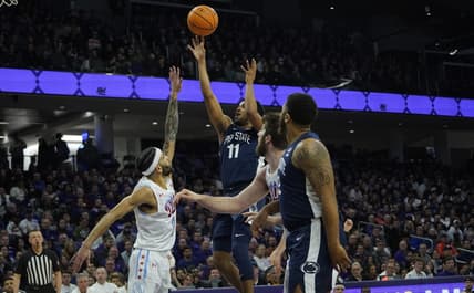 Mar 1, 2023; Evanston, Illinois, USA; Penn State Nittany Lions guard Camren Wynter (11) shoots over Northwestern Wildcats guard Boo Buie (0) during the first half at Welsh-Ryan Arena. Mandatory Credit: David Banks-USA TODAY Sports