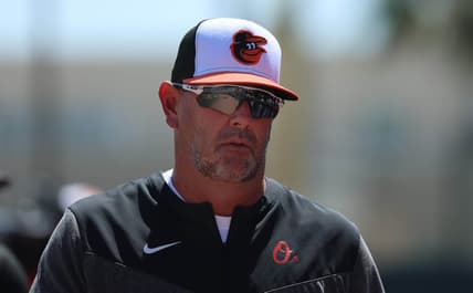 Mar 6, 2023; Sarasota, Florida, USA; Baltimore Orioles manager Brandon Hyde (18) looks on against the Philadelphia Phillies at Ed Smith Stadium. Mandatory Credit: Kim Klement-USA TODAY Sports
