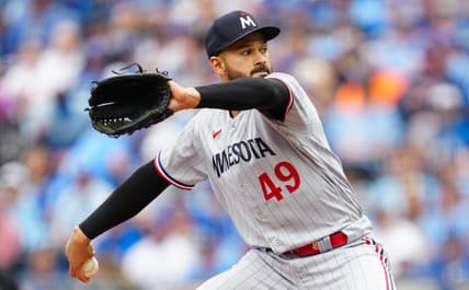 Mar 30, 2023; Kansas City, Missouri, USA; Minnesota Twins starting pitcher Pablo Lopez (49) pitches during the first inning against the Kansas City Royals at Kauffman Stadium. Mandatory Credit: Jay Biggerstaff-USA TODAY Sports