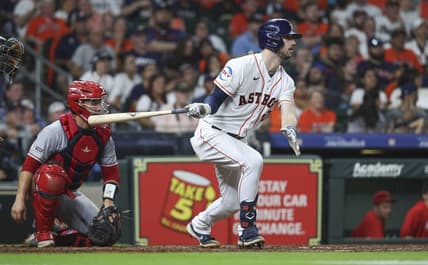 Aug 12, 2023; Houston, Texas, USA; Houston Astros right fielder Kyle Tucker (30) hits a single during the seventh inning against the Los Angeles Angels at Minute Maid Park. Mandatory Credit: Troy Taormina-USA TODAY Sports