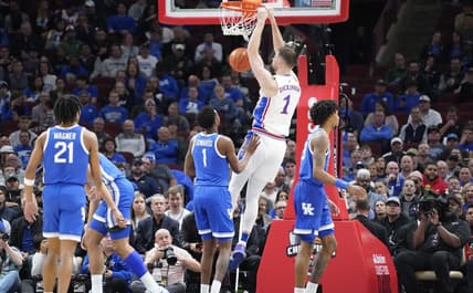Nov 14, 2023; Chicago, Illinois, USA; Kansas Jayhawks center Hunter Dickinson (1) dunks against the Kentucky Wildcats during the first half at United Center. Mandatory Credit: David Banks-USA TODAY Sports