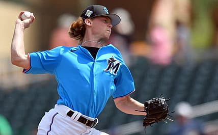 Mar 21, 2022; Jupiter, Florida, USA; Miami Marlins pitcher Max Meyer (63) pitches against the New York Mets in the fourth inning during a spring training game at Roger Dean Stadium. Mandatory Credit: Jim Rassol-USA TODAY Sports