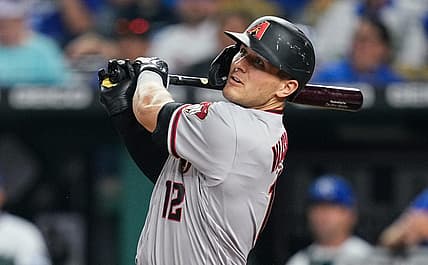Aug 23, 2022; Kansas City, Missouri, USA; Arizona Diamondbacks right fielder Daulton Varsho (12) bats against the Kansas City Royals during the sixth inning at Kauffman Stadium. Mandatory Credit: Jay Biggerstaff-USA TODAY Sports