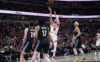 Feb 4, 2023; Chicago, Illinois, USA; Chicago Bulls guard Zach LaVine (8) shoots a three point basket against the Portland Trail Blazers during the first quarter at United Center. Mandatory Credit: David Banks-USA TODAY Sports