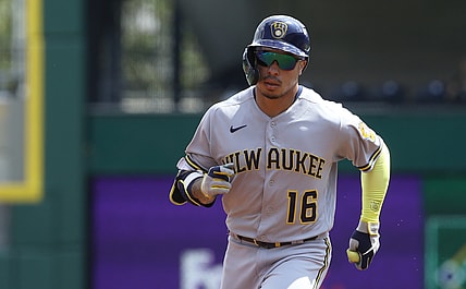 Aug 14, 2021; Pittsburgh, Pennsylvania, USA;  Milwaukee Brewers second baseman Kolten Wong (16) circles the bases on a lead off solo home run against the Pittsburgh Pirates during the first inning at PNC Park. Mandatory Credit: Charles LeClaire-USA TODAY Sports