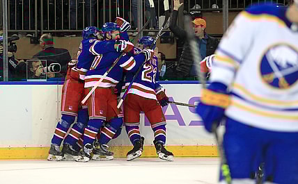 Nov 21, 2021; New York, New York, USA; New York Rangers defenseman Ryan Lindgren (55) celebrates his go-ahead goal with one second left against the Buffalo Sabres during the third period at Madison Square Garden. Mandatory Credit: Danny Wild-USA TODAY Sports