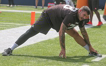 Cleveland Browns offensive lineman Jack Conklin stretches before minicamp on Wednesday, June 15, 2022 in Canton, Ohio, at Tom Benson Hall of Fame Stadium.

Browns Hof 3