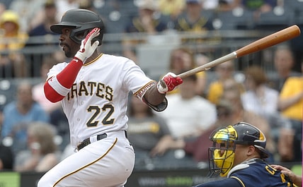 Jul 2, 2023; Pittsburgh, Pennsylvania, USA;  Pittsburgh Pirates designated hitter Andrew McCutchen (22) at bat against the Milwaukee Brewers during the eighth inning at PNC Park. The Brewers won 6-3. Mandatory Credit: Charles LeClaire-USA TODAY Sports