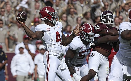 Oct 7, 2023; College Station, Texas, USA; Alabama Crimson Tide quarterback Jalen Milroe (4) attempts a pass during the second quarter against the Texas A&M Aggies at Kyle Field. Mandatory Credit: Troy Taormina-USA TODAY Sports