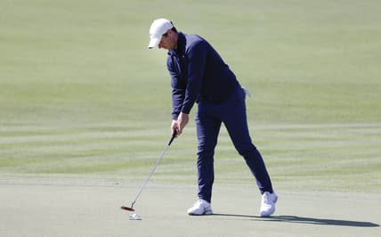 Mar 4, 2021; Orlando, Florida, USA; Rory McIlroy taps in his putt on the 18th green during the first round of the Arnold Palmer Invitational golf tournament at Bay Hill Club & Lodge. Mandatory Credit: Reinhold Matay-USA TODAY Sports