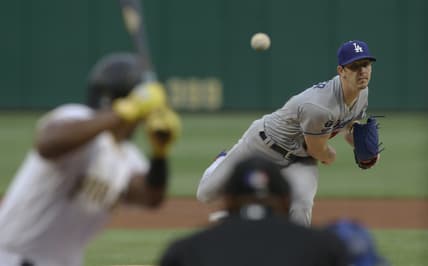 Jun 8, 2021; Pittsburgh, Pennsylvania, USA;  Los Angeles Dodgers starting pitcher Walker Buehler (21) pithes to Pittsburgh Pirates third baseman Ke'Bryan Hayes (13) during the first inning at PNC Park. Mandatory Credit: Charles LeClaire-USA TODAY Sports