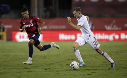 Aug 27, 2022; Frisco, Texas, USA; Real Salt Lake defender Andrew Brody (2) controls the ball past FC Dallas midfielder Edwin Cerrillo (6) during the first half at Toyota Stadium. Mandatory Credit: Kevin Jairaj-USA TODAY Sports