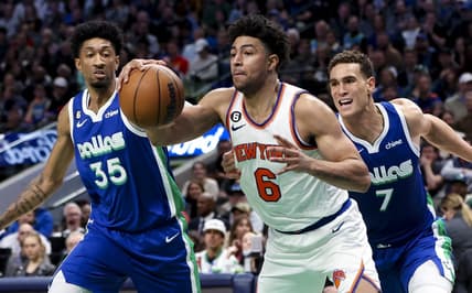 Dec 27, 2022; Dallas, Texas, USA;  New York Knicks guard Quentin Grimes (6) looks to score as Dallas Mavericks center Dwight Powell (7) and Dallas Mavericks forward Christian Wood (35) defend during the second quarter at American Airlines Center. Mandatory Credit: Kevin Jairaj-USA TODAY Sports