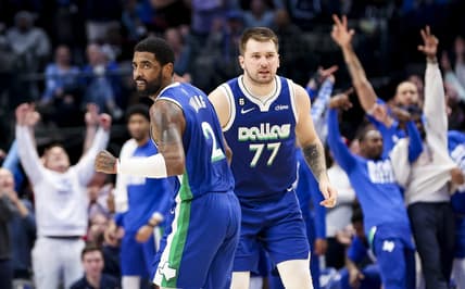 Feb 13, 2023; Dallas, Texas, USA;  Dallas Mavericks guard Kyrie Irving (2) celebrates with Dallas Mavericks guard Luka Doncic (77) during the fourth quarter against the Minnesota Timberwolves at American Airlines Center. Mandatory Credit: Kevin Jairaj-USA TODAY Sports