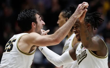 Purdue Boilermakers guard Ethan Morton (25) and Purdue Boilermakers guard Lance Jones (55) celebrate during the NCAA men   s basketball game against the Iowa Hawkeyes, Monday, Dec. 4, 2023, at Mackey Arena in West Lafayette, Ind. Purdue Boilermakers 87-68.