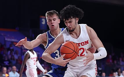 Nov 25, 2022; Paradise Island, BAHAMAS; Dayton Flyers forward Mustapha Amzil (22) controls the ball as Brigham Young Cougars guard Dallin Hall (30) defends during the first half at Imperial Arena. Mandatory Credit: Kevin Jairaj-USA TODAY Sports