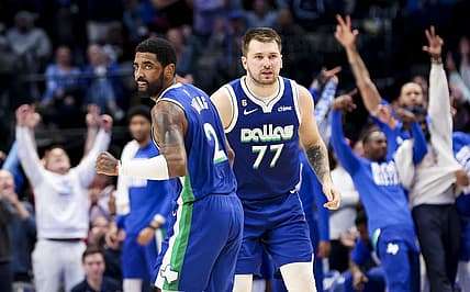 Feb 13, 2023; Dallas, Texas, USA;  Dallas Mavericks guard Kyrie Irving (2) celebrates with Dallas Mavericks guard Luka Doncic (77) during the fourth quarter against the Minnesota Timberwolves at American Airlines Center. Mandatory Credit: Kevin Jairaj-USA TODAY Sports