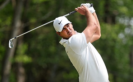 Brooks Koepka hits his tee shot on the third hole at the 2023 PGA Championship.