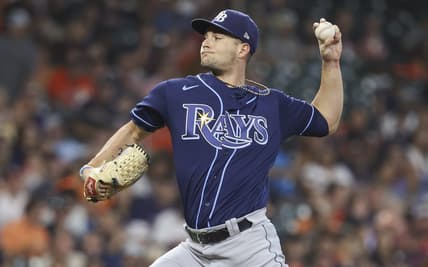 Oct 1, 2022; Houston, Texas, USA; Tampa Bay Rays starting pitcher Shane McClanahan (18) delivers a pitch during the first inning against the Houston Astros at Minute Maid Park. Mandatory Credit: Troy Taormina-USA TODAY Sports