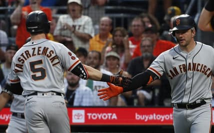 Jul 15, 2023; Pittsburgh, Pennsylvania, USA;  San Francisco Giants catcher Patrick Bailey (right) greets center fielder Mike Yastrzemski (5) crossing home plate on a solo home run against the Pittsburgh Pirates during the second inning at PNC Park. Mandatory Credit: Charles LeClaire-USA TODAY Sports