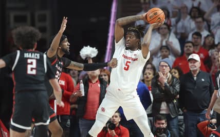 Jan 17, 2024; Houston, Texas, USA; Houston Cougars forward Ja'Vier Francis (5) controls the ball during the first half against the Texas Tech Red Raiders at Fertitta Center. Mandatory Credit: Troy Taormina-USA TODAY Sports