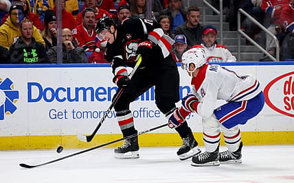 Dec 9, 2023; Buffalo, New York, USA;  Montreal Canadiens defenseman Mike Matheson (8) tries to block a shot by Buffalo Sabres right wing Tage Thompson (72) during the second period at KeyBank Center. Mandatory Credit: Timothy T. Ludwig-USA TODAY Sports