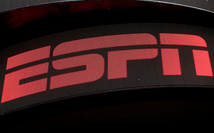 The ESPN logo is seen on an electronic display in Times Square in New York on Aug. 23, 2017.