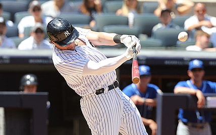 Jun 24, 2021; Bronx, New York, USA; New York Yankees first baseman Luke Voit (59) hits a solo a solo home run against Kansas City Royals during the third inning at Yankee Stadium. Mandatory Credit: Andy Marlin-USA TODAY Sports
