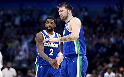 Apr 5, 2023; Dallas, Texas, USA;  Dallas Mavericks guard Luka Doncic (77) and Dallas Mavericks guard Kyrie Irving (2) react during the fourth quarter against the Sacramento Kings at American Airlines Center. Mandatory Credit: Kevin Jairaj-USA TODAY Sports