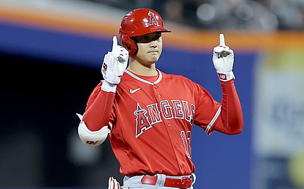 Shohei Ohtani reacts after hitting a double.