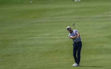 Apr 2, 2021; San Antonio, Texas, USA; Cameron Tringale hits his third shot on hole 18 during the second round of the Valero Texas Open golf tournament. Mandatory Credit: Daniel Dunn-USA TODAY Sports
