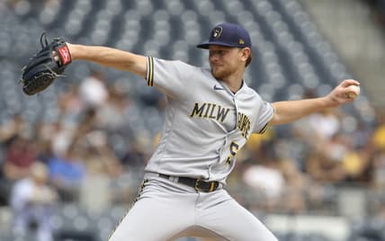 Aug 15, 2021; Pittsburgh, Pennsylvania, USA; Milwaukee Brewers starting pitcher Eric Lauer (52) throws a pitch against the Pittsburgh Pirates during the first inning at PNC Park. Mandatory Credit: Charles LeClaire-USA TODAY Sports