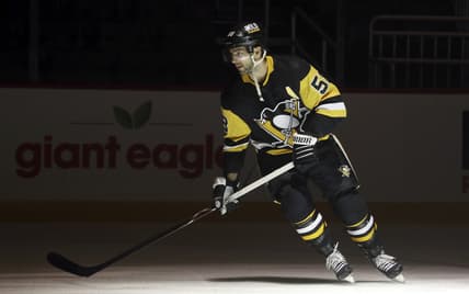 Oct 19, 2021; Pittsburgh, Pennsylvania, USA; Pittsburgh Penguins defenseman Kris Letang (58) makes the ice to play the Dallas Stars at PPG Paints Arena. Dallas won 2-1 in a shootout. Mandatory Credit: Charles LeClaire-USA TODAY Sports