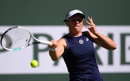 Oct 10, 2021; Indian Wells, CA, USA; Iga Swiatek (POL) hits a shot against Veronika Kudermetova (RUS) at Indian Wells Tennis Garden. Mandatory Credit: Orlando Ramirez-USA TODAY Sports