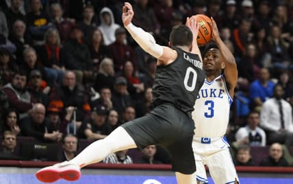Jan 23, 2023; Blacksburg, Virginia, USA; Duke Blue Devils guard Jeremy Roach (3) shoots against Virginia Tech Hokies guard Hunter Cattoor (0) in the first half at Cassell Coliseum. Mandatory Credit: Lee Luther Jr.-USA TODAY Sports