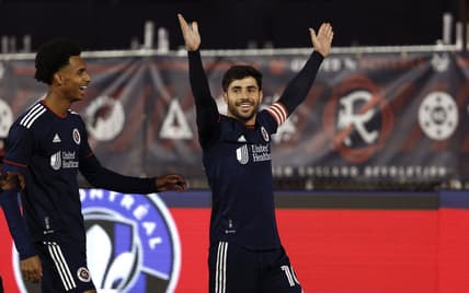Apr 8, 2023; Foxborough, Massachusetts, USA; New England Revolution midfielder Carles Gil (10) celebrates his penalty kick goal against CF Montr  al with New England Revolution midfielder Dylan Borrero (11) during the first half at Gillette Stadium. Mandatory Credit: Winslow Townson-USA TODAY Sports