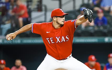 Jun 24, 2022; Arlington, Texas, USA;  Texas Rangers starting pitcher Dane Dunning (33) throws during the first inning against the Washington Nationals at Globe Life Field. Mandatory Credit: Kevin Jairaj-USA TODAY Sports