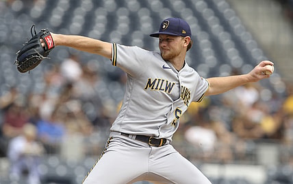 Aug 15, 2021; Pittsburgh, Pennsylvania, USA; Milwaukee Brewers starting pitcher Eric Lauer (52) throws a pitch against the Pittsburgh Pirates during the first inning at PNC Park. Mandatory Credit: Charles LeClaire-USA TODAY Sports