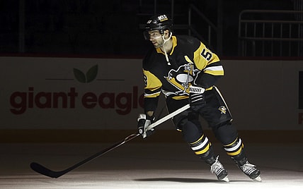 Oct 19, 2021; Pittsburgh, Pennsylvania, USA; Pittsburgh Penguins defenseman Kris Letang (58) makes the ice to play the Dallas Stars at PPG Paints Arena. Dallas won 2-1 in a shootout. Mandatory Credit: Charles LeClaire-USA TODAY Sports