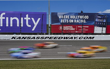Sep 11, 2022; Kansas City, Kansas, USA; A general view of turn three as the field passes during the Hollywood Casino 400 at Kansas Speedway. Mandatory Credit: Jay Biggerstaff-USA TODAY Sports