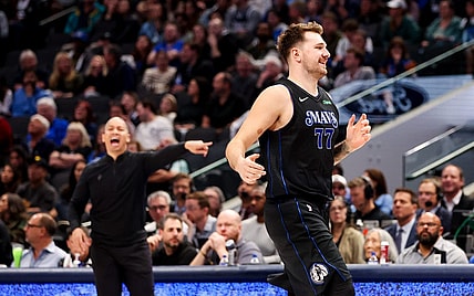 Nov 10, 2023; Dallas, Texas, USA;  Dallas Mavericks guard Luka Doncic (77) reacts in front of LA Clippers head coach Tyronn Lue during the second half at American Airlines Center. Mandatory Credit: Kevin Jairaj-USA TODAY Sports