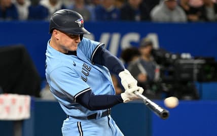 Sep 16, 2022; Toronto, Ontario, CAN;  Toronto Blue Jays third baseman Matt Chapman (26) hits a single against the Baltimore Orioles in the fifth inning at Rogers Centre. Mandatory Credit: Dan Hamilton-USA TODAY Sports