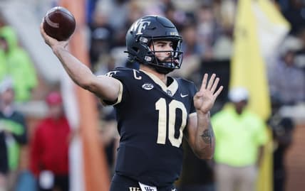 Oct 22, 2022; Winston-Salem, North Carolina, USA;  Wake Forest Demon Deacons quarterback Sam Hartman (10) throws a pass during the second half against the Boston College Eagles at Truist Field. Mandatory Credit: Reinhold Matay-USA TODAY Sports