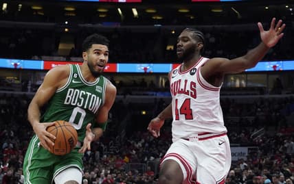 Oct 24, 2022; Chicago, Illinois, USA; Chicago Bulls forward Patrick Williams (44) defends Boston Celtics forward Jayson Tatum (0) during the second half at United Center. Mandatory Credit: David Banks-USA TODAY Sports